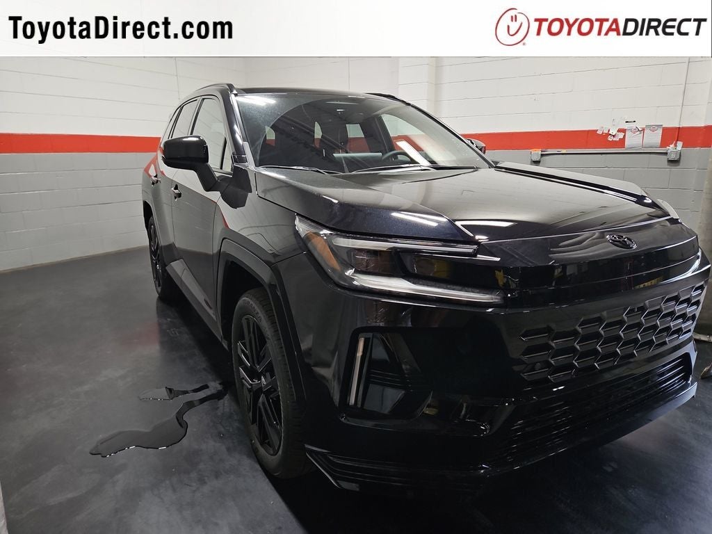 2026 Toyota RAV4 Plug-In Hybrid XSE in Midnight Black Metallic — front three-quarter view