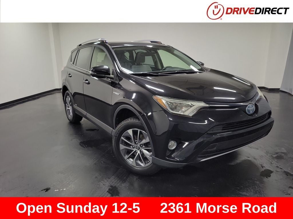 2017 Toyota RAV4 Hybrid XLE in Black Sand Pearl — front three-quarter view