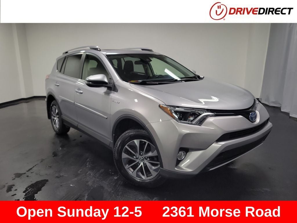 2017 Toyota RAV4 Hybrid XLE in Silver Sky Metallic — front three-quarter view