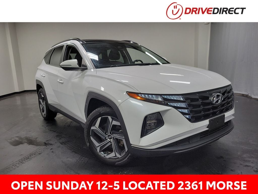 2022 Hyundai Tucson Hybrid SEL Convenience in Quartz White — front three-quarter view