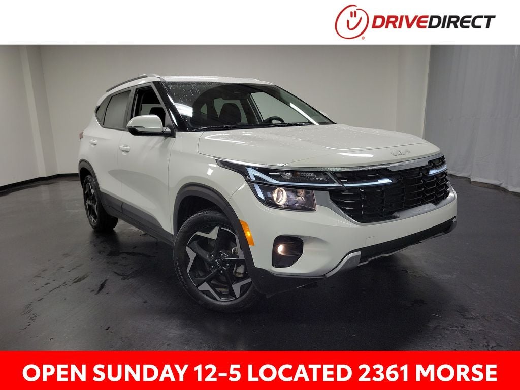 2025 Kia Seltos S in Snow White Pearl — front three-quarter view