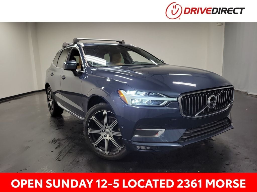 2021 Volvo XC60 T5 Inscription in Denim Blue Metallic — front three-quarter view